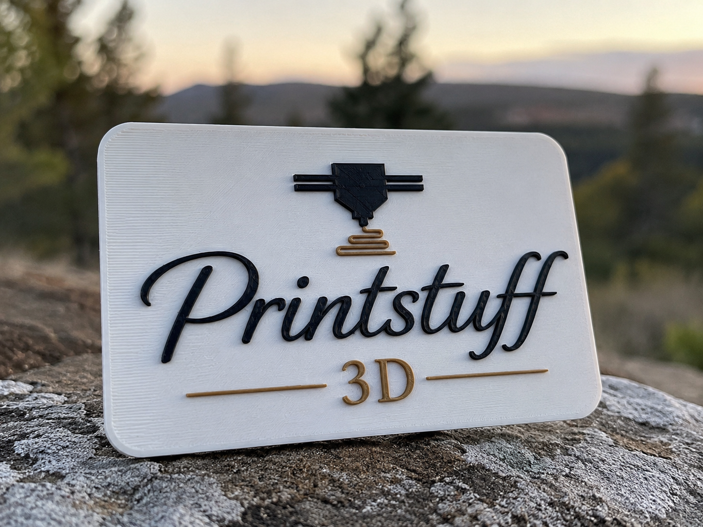 Printstuff 3D logga på 3D-printad bricka